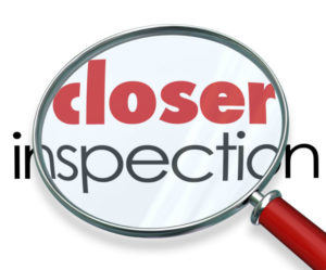 closer inspection magnify glass