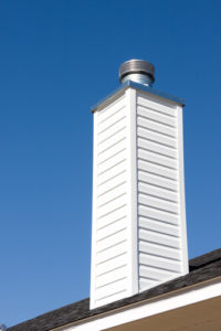 Prefabricated chimney on a new roof