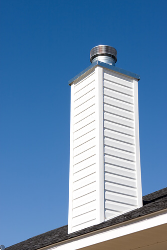 Prefabricated chimney on a new roof